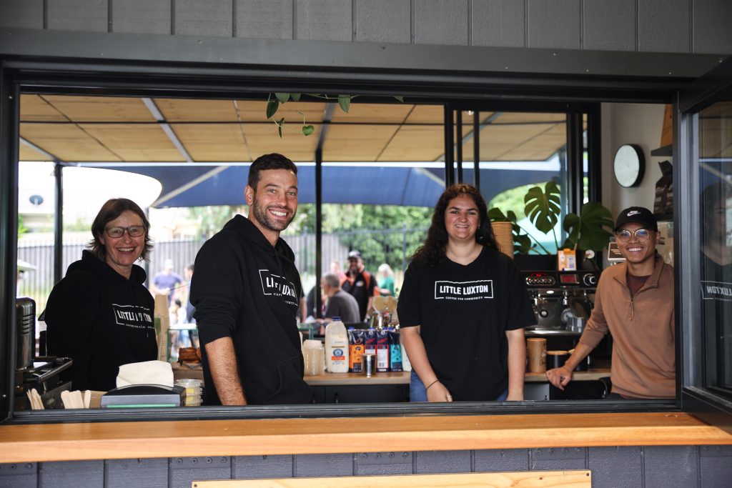 4 staff members at Little Luxton smiling at the camera