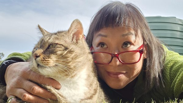 Close-up photo of Shanan Lee and one of her cats